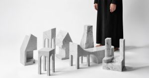 carved from solid carrara marble, abstract house-like things check out architectural type